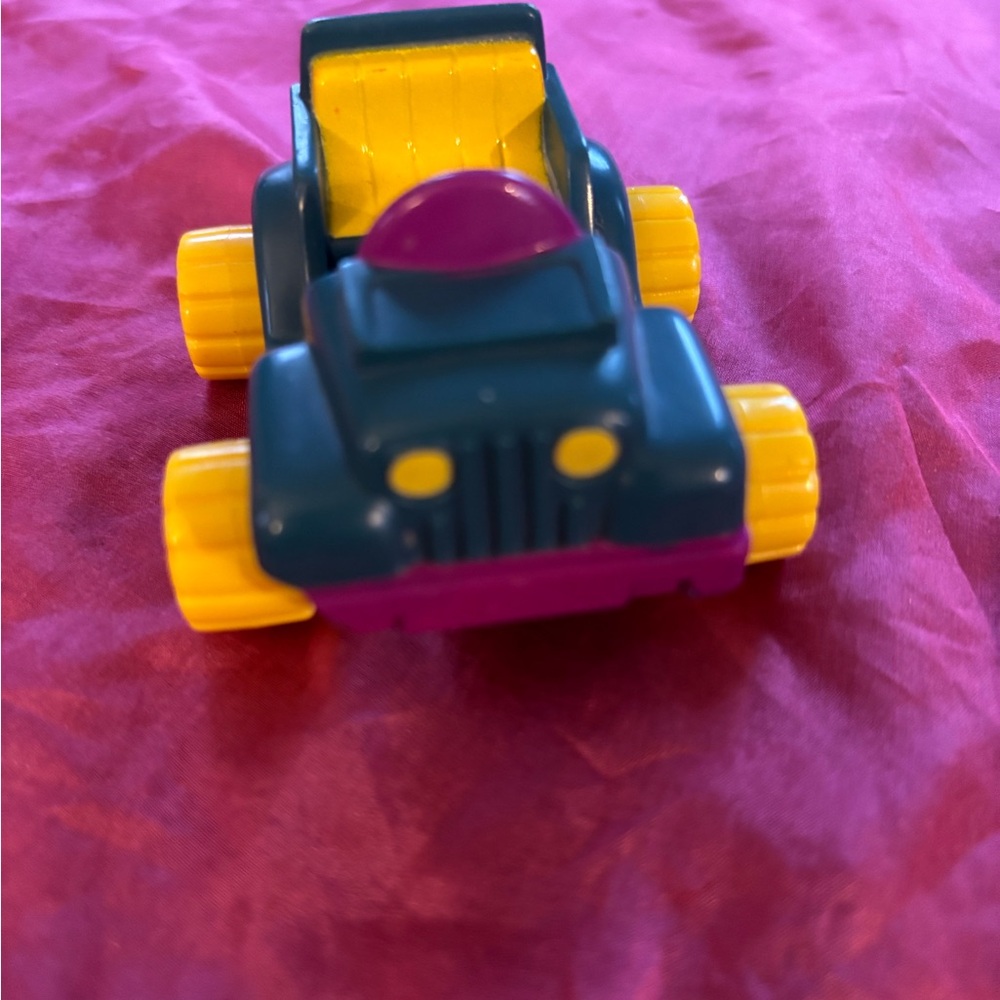 McDonald's Happy Meal 1988 Garfield blue, purple and yellow jeep.